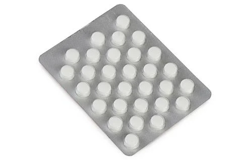 Tablets in packing isolated on white 스톡 사진