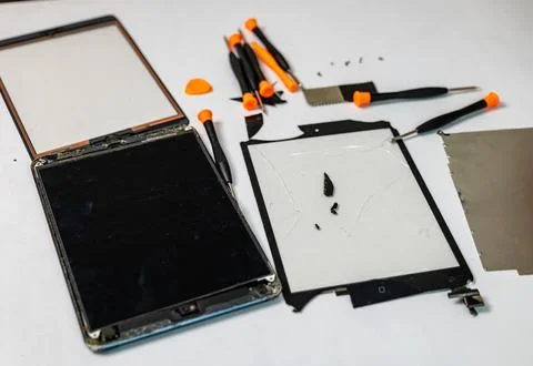Tablets for Repair with Tool Kits Stockfoto's