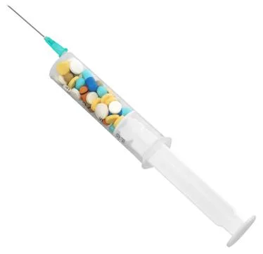 Tablets in syringe Stock Photos