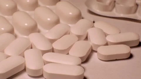 Tablets . white tablets. close-up . the concept of health, treatment. Stock Footage 220677350