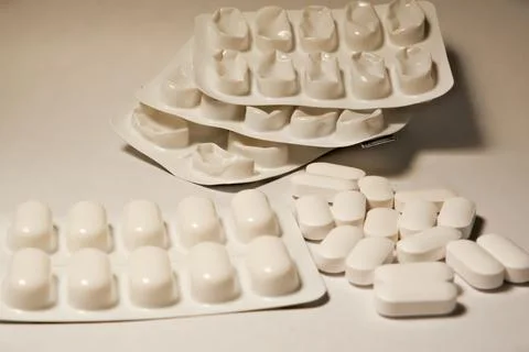 Tablets . white tablets. close-up . the concept of health, treatment. Stock Photos