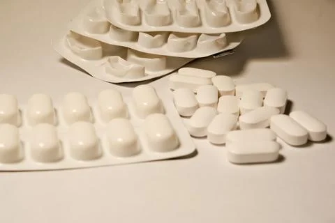 Tablets . white tablets. close-up . the concept of health, treatment. Stock Photos