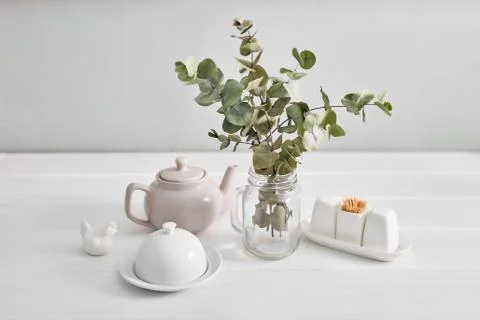 Tableware and decorations for serving festive table on light background. Stock Photos