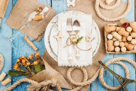 Tableware and silverware with dry flowers Stock Photos