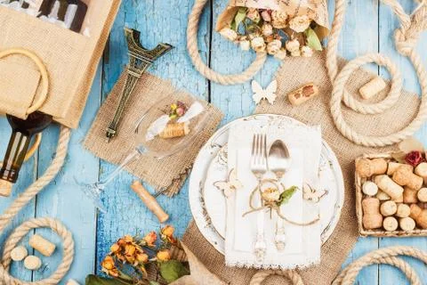 Tableware and silverware with dry flowers Stock Photos