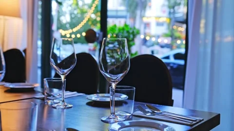 Tableware and Wine Glasses Set for Dinner in Tiny Cosy French Style Restaurant Stock Footage 250473497