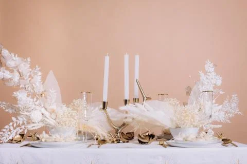 Tableware beige background cutlery candlestick restaurant luxury Stock Photos
