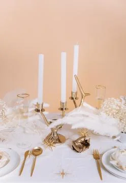 Tableware beige background cutlery candlestick restaurant luxury Stock Photos