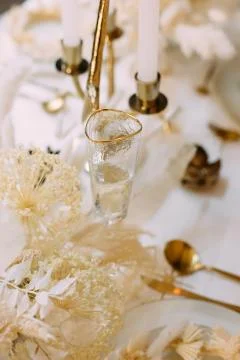 Tableware beige background cutlery candlestick restaurant luxury Stock Photos