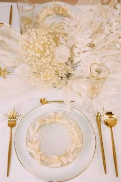 Tableware beige background cutlery candlestick restaurant luxury Stock Photos