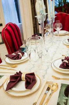 Tableware on dining table Stock Photos