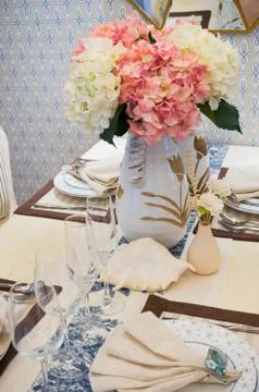 Tableware on dining table Stock Photos