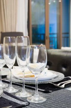 Tableware on dining table Stock Photos