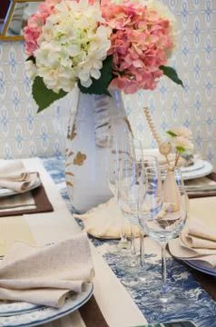 Tableware on dining table Stock Photos