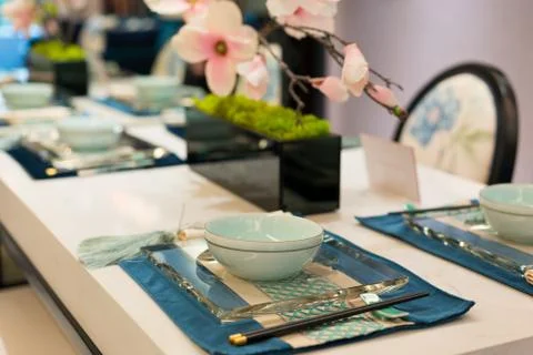 Tableware on dining table Stock Photos