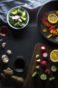 Tableware, ginger and vegetables for making sushi free space. Asian cuisine Foto stock
