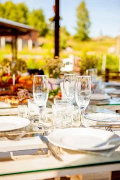 Tableware glasses and bottles Stock Photos
