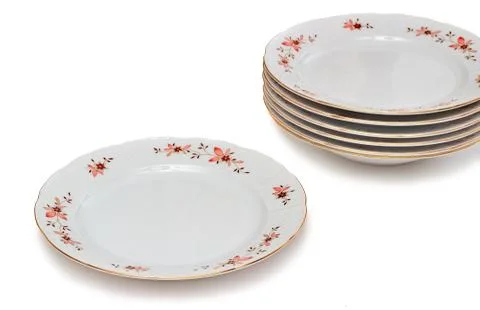 Tableware, plates on a white background. Stock Photos