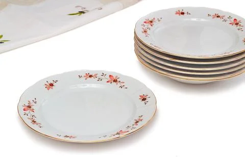 Tableware, plates on a white background. Stock Photos