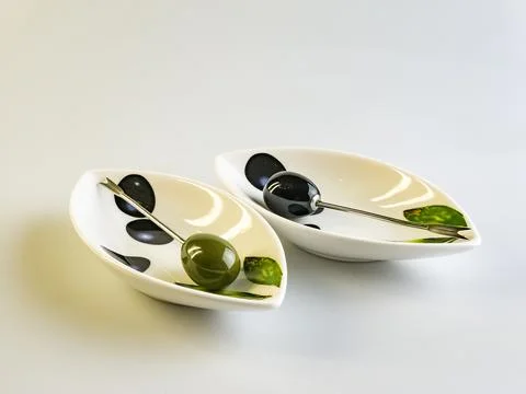 Tableware set for olives on a white background. Foto stock