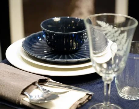 Tableware set. Set of different plates on the table Stock-Fotos