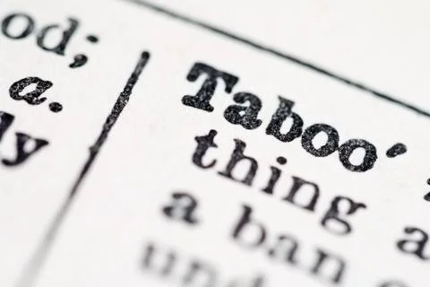 Taboo word in dictionary Stock Photos