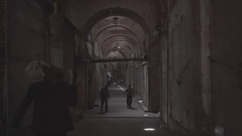 Tabriz Grand Bazaar Corridor Static Shot Man Carrying Carpet People Walking Iran Stock Footage 331593397