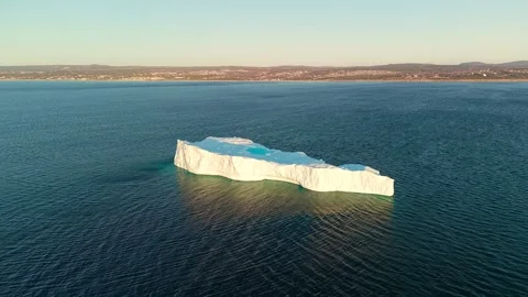 Tabular Iceberg Circular Turquoise Pool Warm Evening Light Newfoundland Video stock 334648927