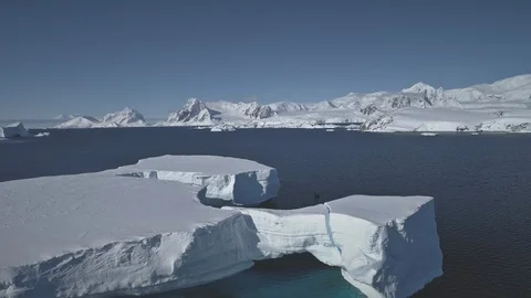 Tabular iceberg float antarctic ocean aerial view Stock Footage 104467096