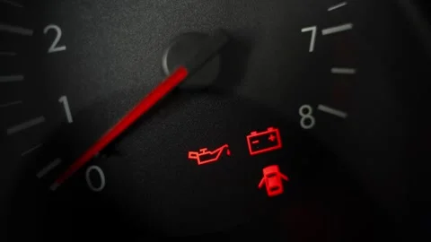 Tachometer of a non-started car with icons when the ignition is on. Battery, oil Stock Footage 255764149