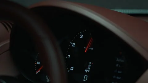 Tachometer red arrow jumping, close-up 動画素材 166038203