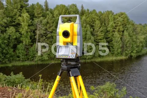 The tachymeter is used in the field to determine the coordinates Stock Photos