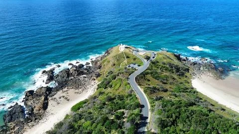 Tacking Point Lighthouse and Rugged Coastal Headland Stock Photos