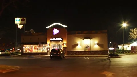 Taco Bell at night drive by Stock Footage 170728446