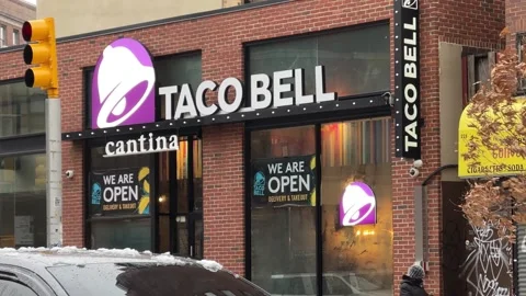 Taco Bell we are open sign during covid pandemic lockdown in New York City NYC 動画素材 148344138