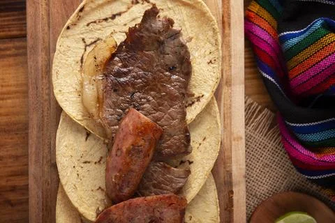 Taco campechano style, Carne Asada. (roast meat) and chorizo or longaniza, ve Stock Photos