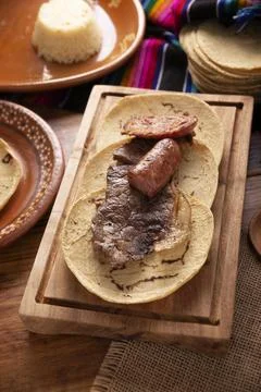 Taco campechano style, Carne Asada. (roast meat) and chorizo or longaniza, ve Stock Photos