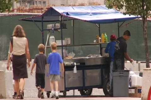 Taco stand in rain Stock Footage 522671
