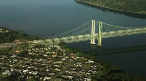 Tacoma Narrows Bridge and Reflection on Water - Aerial View Stock Footage 11343530