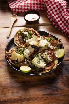 Tacos al pastor. Also known as Tacos de Trompo, they are the most popular typ Stock Photos