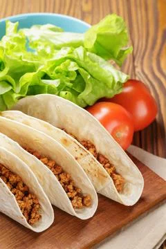 Tacos with beef and chilli on old wooden table rustic style Stock Photos
