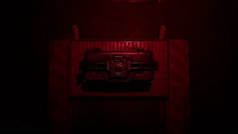 Tactical action: soldier decodes locks in a dimly lit hangar Video stock 137528635