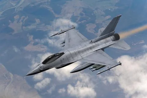 Tactical fighter, a high-speed combat airplane with missiles on the background o Stock Photos