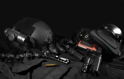 Tactical gear laying composition. Stock Photos