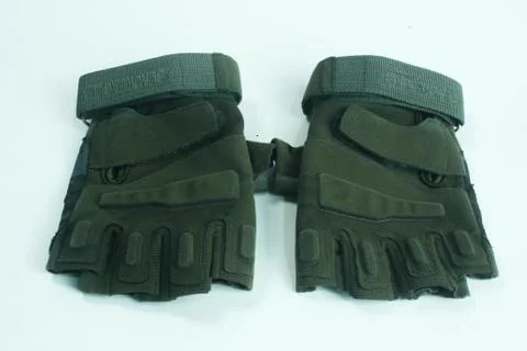 Tactical gloves have padding on the back and an anti-slip coating on the fron Foto stock