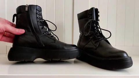 Tactile Boot Showcase: Upright and Side View with Hand Touch 스톡 동영상 321518286