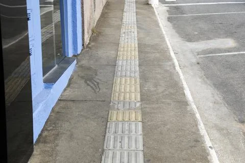 Tactile floor - accessibility range Stock Photos
