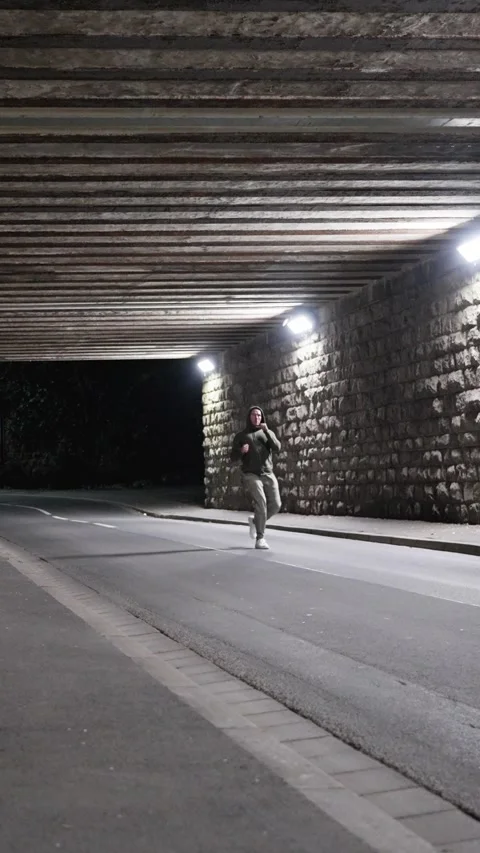 Taekwondo training at night, practices kicks, Spinning kick. A man wearing Stock Footage 312742973