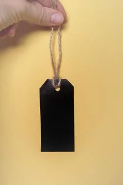 Tag in hand 库存照片