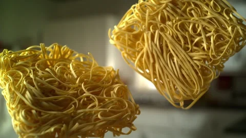 Tagliatelle nests tossed Stock Footage 219486864